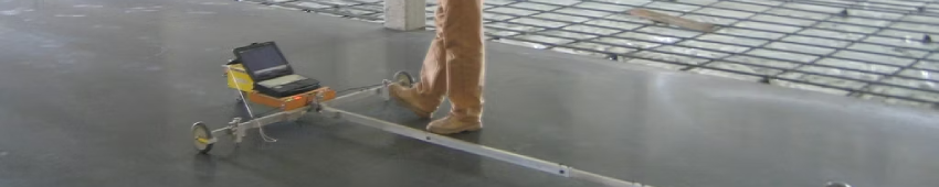 Concrete slab flatness verification using precision measurement equipment to validate automation ready floor performance in a high traffic distribution center.